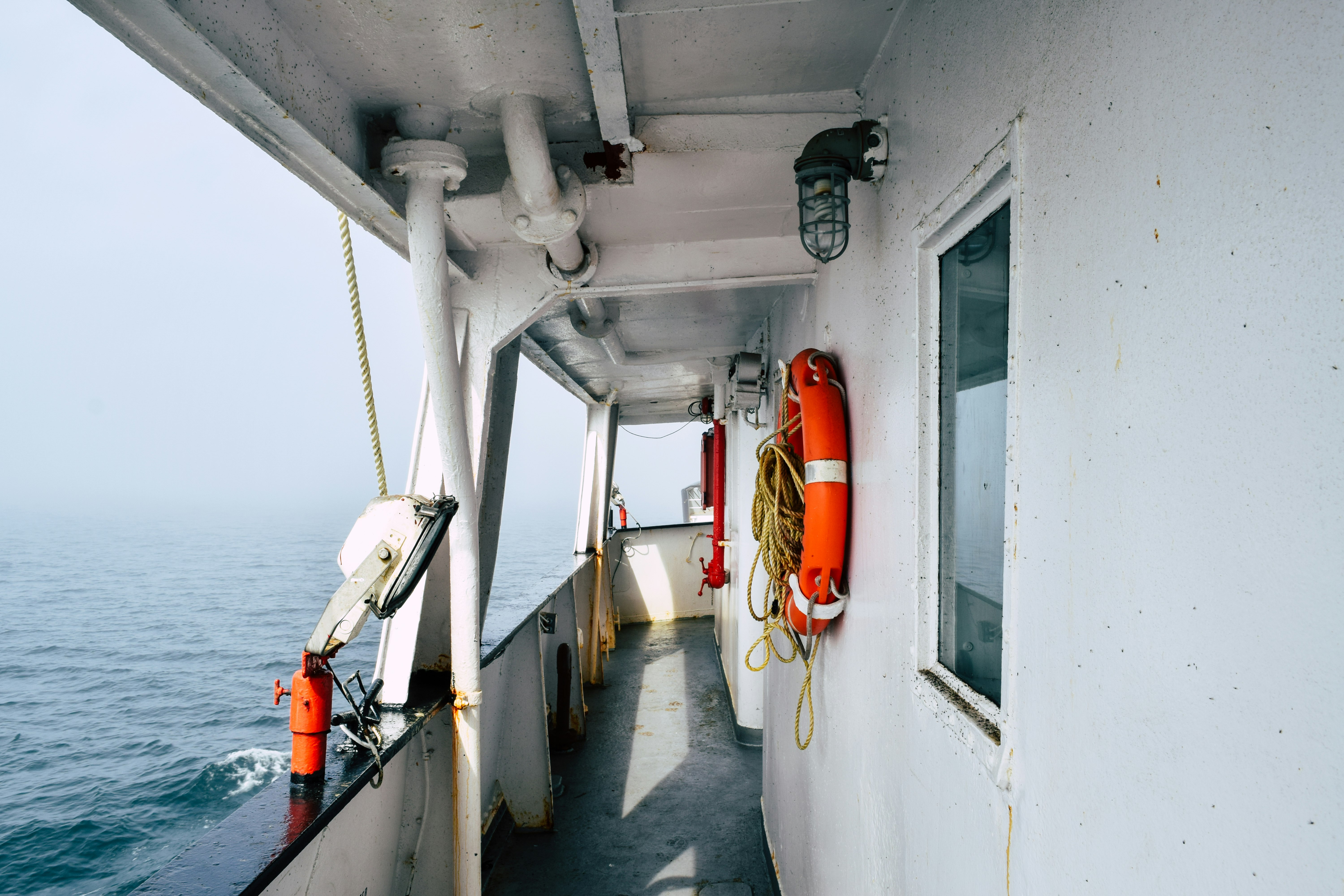 ship travelling surrounded by fogs